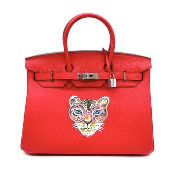 Cartera de cuero intervenida 